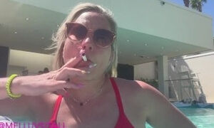 MILF Lights Up a Cigarette in a Vegas Pool With Everyone Watching