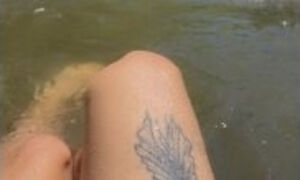 Refreshing summer day. Femboy semi naked in the middle of the lake, alone and hot