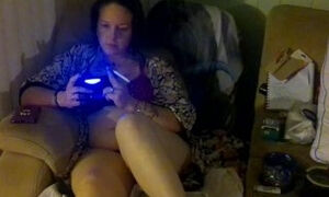 Busty Milf In Purple Bra and Panties Smoking Cigarettes and Playing Video Games